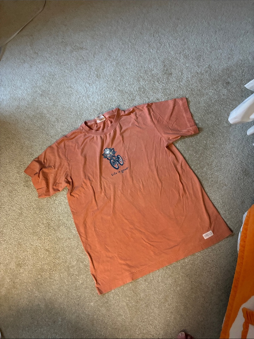 Rust Orange Graphic Tee with Bicycle Illustration
